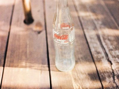 Soft sunlight hitting a wooden table surface